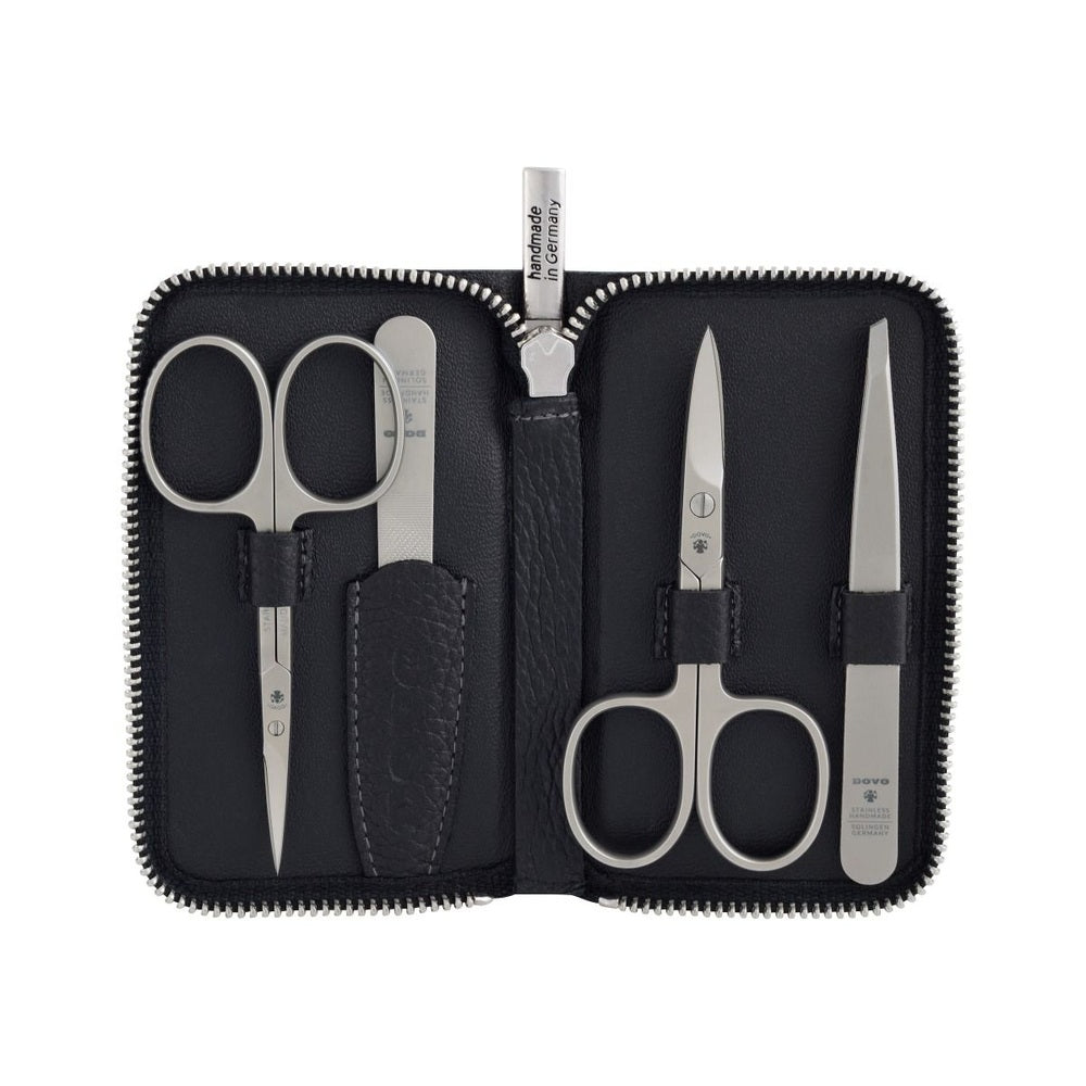 Dovo care case No. 5 in black cowhide with four satin-finished stainless steel instruments